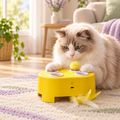 Cheese Chase yellow pop-up cat toy with a curious cat